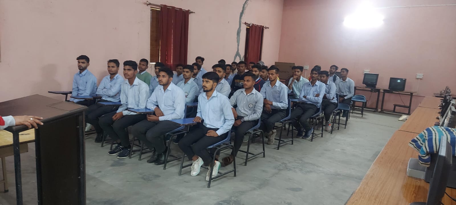 Trainees together in the lecture hall